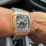 Cartier Roadster on wrist with custom green alligator leather strap
